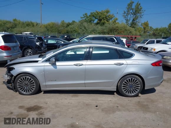 ✅ 2017 Ford Fusion Hybrid Titanium • VIN: 3FA6P0RU4HR387052 • Лот: 43191238. Опубликован ранее на IAAI с пробегом 204 571 миль. Бесплатный доступ к архиву аукционных продаж из США и подробный отчёт об истории автомобиля на DreamBid. Изображение 15.