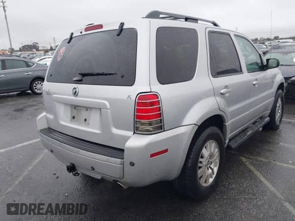 2005 Mercury Mariner Luxury z VIN 4M2CU561X5DJ16539, wystawiony jako IAAI lot #41572981 z przebiegiem 157 461 mil mil oraz . Historia ofert i sprzedaży dostępna na DreamBid. Obrazek 4.