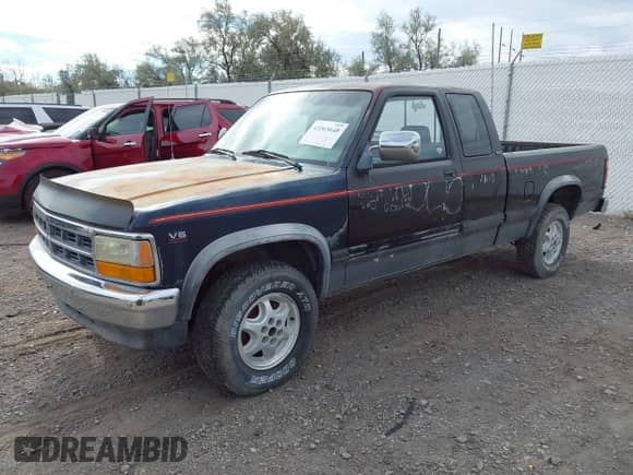 1994 Dodge Dakota with VIN 1B7GG23X9RS562415, listed as a IAAI auction lot 43365648 with 157,671 mi miles and . Bid and sale history available at DreamBid. Image 2.