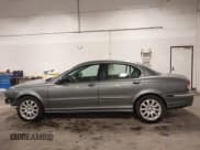 ✅ 2003 Jaguar X-Type 2.5L Manual • VIN: SAJEA51D33XD13416 • Lot: 43210908. Listed on IAAI with 195,057 mi. Free auction sales archive from the USA and detailed vehicle history report at DreamBid. Image 14.