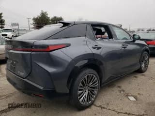 ✅ 2023 Lexus RZ 450e Premium • VIN: JTJAAAAB0PA016532 • Lot: 39689614. Listed on Copart with 4,108 mi. Free auction sales archive from the USA and detailed vehicle history report at DreamBid. Image 3.