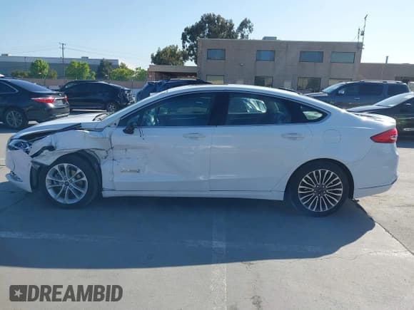 ✅ 2017 Ford Fusion Hybrid Titanium • VIN: 3FA6P0RU3HR323164 • Lot: 42303571. Listed on IAAI with 119,732 mi. Free auction sales archive from the USA and detailed vehicle history report at DreamBid. Image 15.