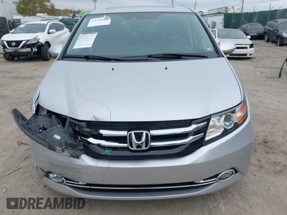 ✅ 2015 Honda Odyssey Touring Elite • VIN: 5FNRL5H93FB115023 • Lot: 43558983. Listed on IAAI with 98,221 mi. Free auction sales archive from the USA and detailed vehicle history report at DreamBid. Image 12.