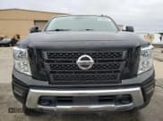 ✅ 2020 Nissan Titan Platinum Reserve • VIN: 1N6AA1ED9LN502853 • Lot: 83885624. Wystawiony na Copart z przebiegiem Nie podano. Bezpłatny archiwum sprzedaży aukcyjnych z USA i szczegółowy raport historii pojazdu na DreamBid. Zdjęcie 5.