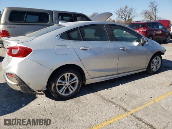 ✅ 2017 Chevrolet Cruze LT • VIN: 1G1BE5SM8H7262383 • Lot: 68044492. Listed on Copart with 74,397 mi. Free auction sales archive from the USA and detailed vehicle history report at DreamBid. Image 3.