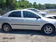 ✅ 2005 Toyota Corolla CE • VIN: JTDBR32E250055971 • Lot: 42660536. Listed on IAAI with 299,999 mi. Free auction sales archive from the USA and detailed vehicle history report at DreamBid. Image 13.