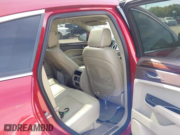 ✅ 2016 Cadillac SRX Luxury Collection • VIN: 3GYFNBE34GS562880 • Lot: 43370945. Wystawiony na IAAI z przebiegiem 128 891 mil. Bezpłatny archiwum sprzedaży aukcyjnych z USA i szczegółowy raport historii pojazdu na DreamBid. Zdjęcie 8.