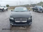 ✅ 2017 Lincoln MKZ Hybrid Reserve • VIN: 3LN6L5MU0HR602531 • Lot: 43642664. Wystawiony na IAAI z przebiegiem 247 032 mil. Bezpłatny archiwum sprzedaży aukcyjnych z USA i szczegółowy raport historii pojazdu na DreamBid. Zdjęcie 12.