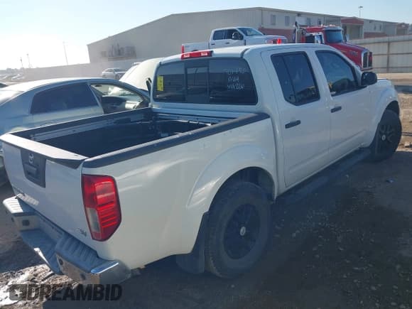 ✅ 2021 Nissan Frontier SV • VIN: 1N6ED0EA6MN701496 • Lot: 43144366. Listed on IAAI with 81,457 mi. Free auction sales archive from the USA and detailed vehicle history report at DreamBid. Image 4.