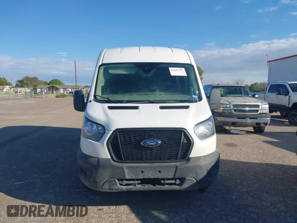 ✅ 2023 Ford Transit Cargo • VIN: 1FTBR2C81PKB38124 • Lot: 43209787. Listed on IAAI with 55,552 mi. Free auction sales archive from the USA and detailed vehicle history report at DreamBid. Image 11.