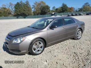 ✅ 2012 Chevrolet Malibu 1LS • VIN: 1G1ZB5E03CF260278 • Lot: 77217114. Listed on Copart with 148,952 mi. Free auction sales archive from the USA and detailed vehicle history report at DreamBid. Image 1.