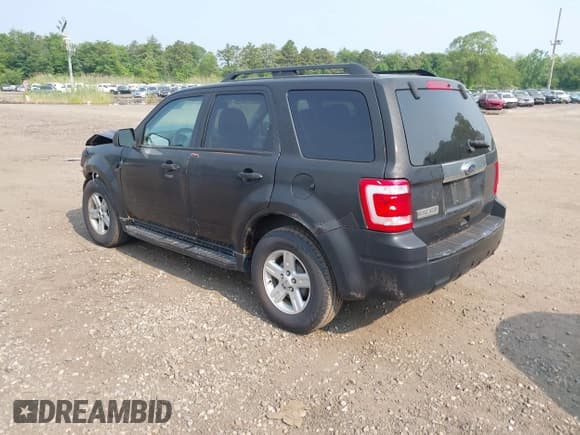 ✅ 2011 Ford Escape Hybrid • VIN: 1FMCU4K37BKA45651 • Lot: 42441757. Listed on IAAI with 504,073 mi. Free auction sales archive from the USA and detailed vehicle history report at DreamBid. Image 3.