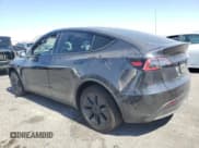 ✅ 2025 Tesla Model Y Long Range • VIN: 7SAYGDED2SF266130 • Lot: 80688045. Wystawiony na Copart z przebiegiem 7 556 mil. Bezpłatny archiwum sprzedaży aukcyjnych z USA i szczegółowy raport historii pojazdu na DreamBid. Zdjęcie 2.