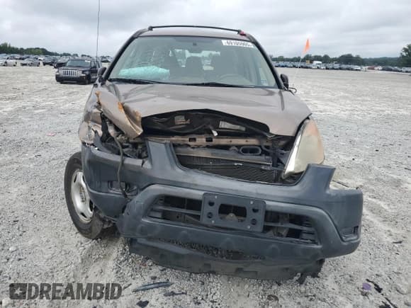 ✅ 2004 Honda CR-V LX • VIN: JHLRD68554C002137 • Lot: 69105905. Listed on Copart with 150,433 mi. Free auction sales archive from the USA and detailed vehicle history report at DreamBid. Image 5.