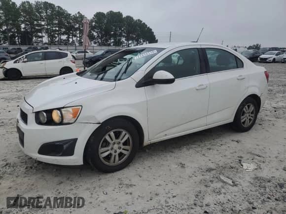 2015 Chevrolet Sonic LT z VIN 1G1JC5SHXF4103013, wystawiony jako Copart lot #71414114 z przebiegiem 169 575 mil mil oraz Szkoda całkowita • Salvage title. Historia ofert i sprzedaży dostępna na DreamBid. Obrazek 1.