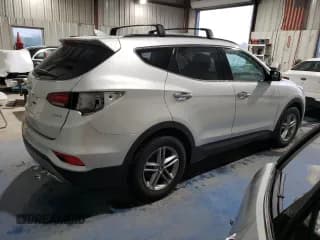 ✅ 2017 Hyundai Santa Fe 2.4L • VIN: 5XYZU3LB3HG492541 • Лот: 50541313. Опубликован ранее на Copart с пробегом 39 856 миль. Бесплатный доступ к архиву аукционных продаж из США и подробный отчёт об истории автомобиля на DreamBid. Изображение 3.
