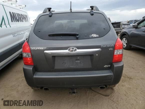 2007 Hyundai Tucson SE with VIN KM8JN72D57U518473, listed as a Copart auction lot 71998814 with 106,340 mi miles and Salvage title. Bid and sale history available at DreamBid. Image 6.