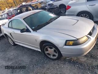 ✅ 2003 Ford Mustang Standard • VIN: 1FAFP40483F336213 • Lot: 43780203. Listed on IAAI with 102,274 mi. Free auction sales archive from the USA and detailed vehicle history report at DreamBid. Image 1.