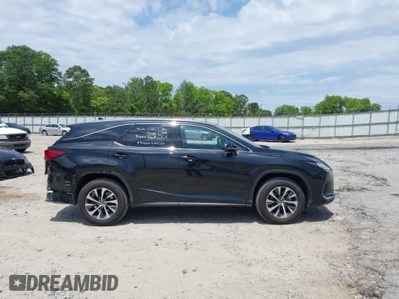 ✅ 2021 Lexus RX 350L • VIN: JTJHZKFA8M2034019 • Lot: 42243974. Listed on IAAI with 61,935 mi. Free auction sales archive from the USA and detailed vehicle history report at DreamBid. Image 14.