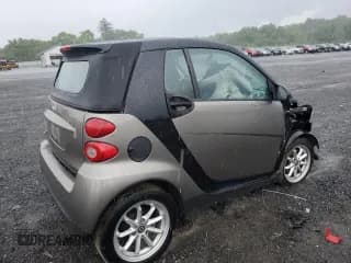 ✅ 2009 Smart fortwo Passion • VIN: WMEEK31XX9K267579 • Лот: 63469494. Опубликован ранее на Copart с пробегом 110 705 миль. Бесплатный доступ к архиву аукционных продаж из США и подробный отчёт об истории автомобиля на DreamBid. Изображение 3.