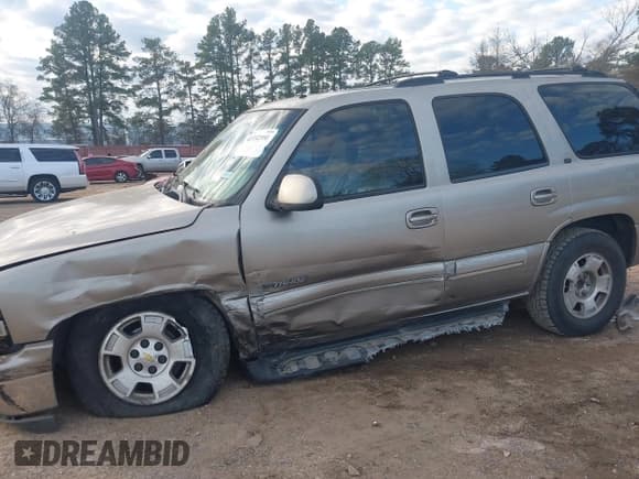 ✅ 2002 Chevrolet Tahoe LT • VIN: 1GNEC13Z52R167375 • Lot: 41332351. Listed on IAAI with 283,486 mi. Free auction sales archive from the USA and detailed vehicle history report at DreamBid. Image 6.