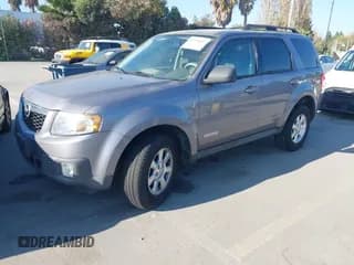 ✅ 2008 Mazda Tribute Touring • VIN: 4F2CZ02ZX8KM14269 • Lot: 43794132. Wystawiony na IAAI z przebiegiem 161 694 mil. Bezpłatny archiwum sprzedaży aukcyjnych z USA i szczegółowy raport historii pojazdu na DreamBid. Zdjęcie 2.