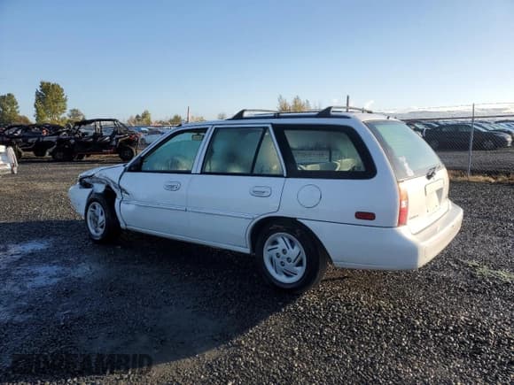 ✅ 1998 Ford Escort SE • VIN: 3FAFP15PXWR242102 • Lot: 77914714. Wystawiony na Copart z przebiegiem 164 333 mil. Bezpłatny archiwum sprzedaży aukcyjnych z USA i szczegółowy raport historii pojazdu na DreamBid. Zdjęcie 2.