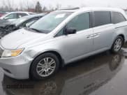 ✅ 2012 Honda Odyssey EX-L • VIN: 5FNRL5H61CB030022 • Lot: 43730404. Listed on IAAI with 153,349 mi. Free auction sales archive from the USA and detailed vehicle history report at DreamBid. Image 2.