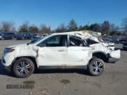 ✅ 2017 Honda Pilot EX-L • VIN: 5FNYF6H5XHB098584 • Lot: 43664045. Listed on IAAI with 119,767 mi. Free auction sales archive from the USA and detailed vehicle history report at DreamBid. Image 14.