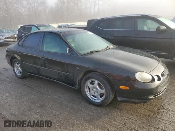 ✅ 1996 Ford Taurus • VIN: 1FALP54N1TA266546 • Lot: 93531385. Wystawiony na Copart z przebiegiem 91 831 mil. Bezpłatny archiwum sprzedaży aukcyjnych z USA i szczegółowy raport historii pojazdu na DreamBid. Zdjęcie 4.