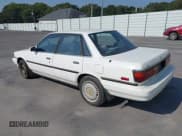 ✅ 1989 Toyota Camry • VIN: JT2VV22E2K0086760 • Lot: 43238305. Wystawiony na IAAI z przebiegiem 306 896 mil. Bezpłatny archiwum sprzedaży aukcyjnych z USA i szczegółowy raport historii pojazdu na DreamBid. Zdjęcie 3.