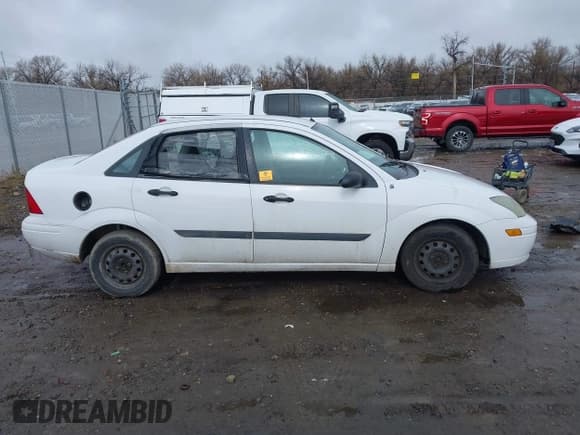 ✅ 2003 Ford Focus LX • VIN: 1FAFP33PX3W181700 • Lot: 41910086. Listed on IAAI with 139,777 mi. Free auction sales archive from the USA and detailed vehicle history report at DreamBid. Image 13.