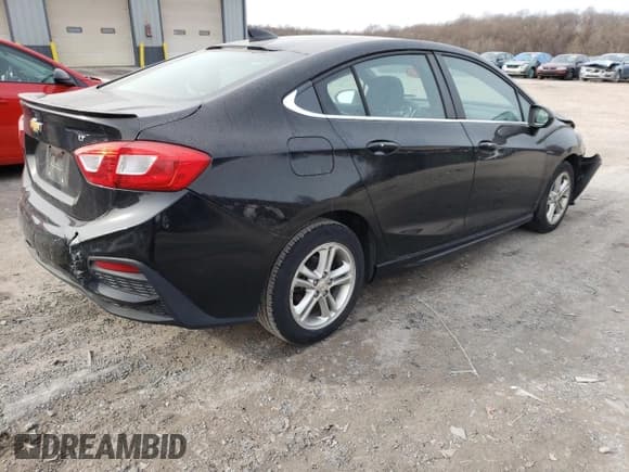 ✅ 2017 Chevrolet Cruze LT • VIN: 1G1BE5SM0H7262717 • Lot: 70741672. Listed on Copart with 104,057 mi. Free auction sales archive from the USA and detailed vehicle history report at DreamBid. Image 3.