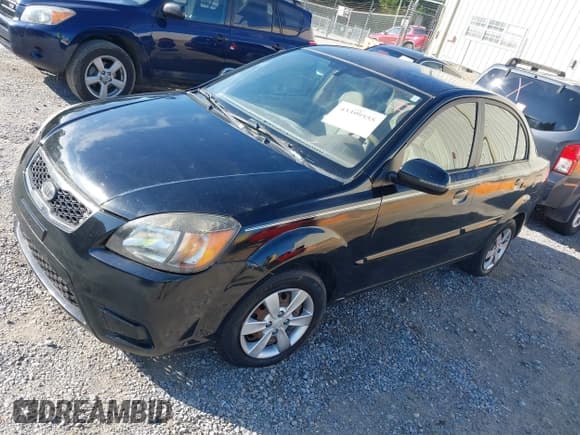 ✅ 2010 Kia Rio LX • VIN: KNADH4A34A6655641 • Lot: 43399555. Listed on IAAI with 68,522 mi. Free auction sales archive from the USA and detailed vehicle history report at DreamBid. Image 2.