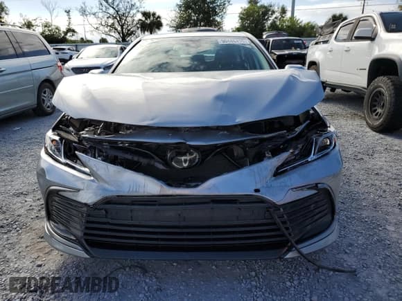 ✅ 2024 Toyota Camry LE • VIN: 4T1R11AK8RU205514 • Lot: 90446415. Listed on Copart with 25,713 mi. Free auction sales archive from the USA and detailed vehicle history report at DreamBid. Image 5.