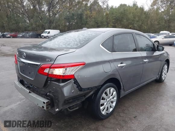 ✅ 2015 Nissan Sentra S • VIN: 3N1AB7AP5FY279739 • Lot: 43541409. Listed on IAAI with 256,187 mi. Free auction sales archive from the USA and detailed vehicle history report at DreamBid. Image 4.