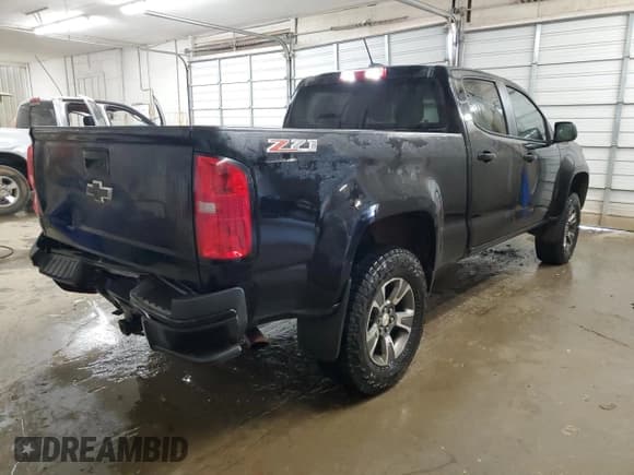 ✅ 2015 Chevrolet Colorado 4WD Z71 • VIN: 1GCGTCE35F1120129 • Лот: 77395114. Опубликован ранее на Copart с пробегом 123 138 миль. Бесплатный доступ к архиву аукционных продаж из США и подробный отчёт об истории автомобиля на DreamBid. Изображение 3.