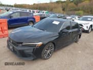 ✅ 2023 Honda Civic Touring • VIN: 2HGFE1F91PH311709 • Lot: 43571029. Wystawiony na IAAI z przebiegiem 31 900 mil. Bezpłatny archiwum sprzedaży aukcyjnych z USA i szczegółowy raport historii pojazdu na DreamBid. Zdjęcie 2.