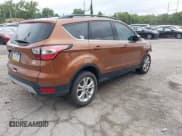 ✅ 2017 Ford Escape SE • VIN: 1FMCU9GD7HUD95311 • Lot: 42685526. Listed on IAAI with 95,785 mi. Free auction sales archive from the USA and detailed vehicle history report at DreamBid. Image 4.
