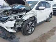 ✅ 2016 Honda CR-V Touring • VIN: 5J6RM3H91GL018249 • Lot: 43543411. Listed on IAAI with 61,037 mi. Free auction sales archive from the USA and detailed vehicle history report at DreamBid. Image 6.