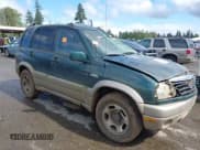 ✅ 2002 Suzuki Grand Vitara JLX • VIN: JS3TD62V824153848 • Lot: 42254276. Listed on IAAI with 181,007 mi. Free auction sales archive from the USA and detailed vehicle history report at DreamBid. Image 1.
