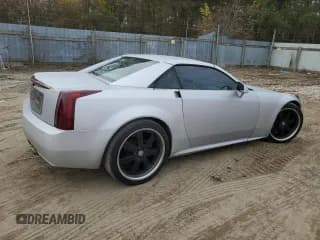✅ 2005 Cadillac XLR • VIN: 1G6YV34AX55603706 • Лот: 81643824. Опубликован ранее на Copart с пробегом 84 951 миль. Бесплатный доступ к архиву аукционных продаж из США и подробный отчёт об истории автомобиля на DreamBid. Изображение 3.