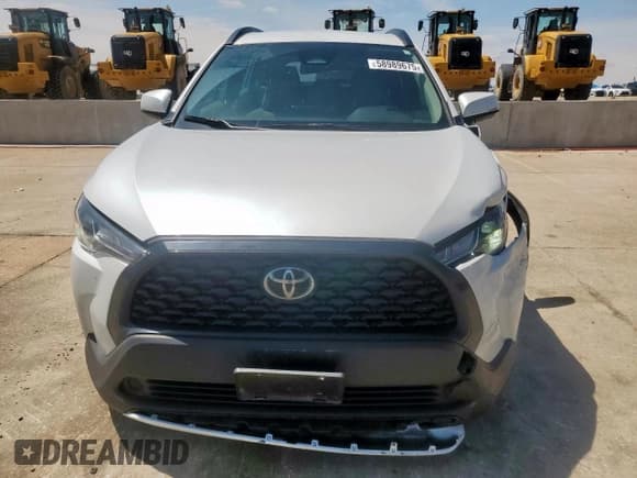 ✅ 2023 Toyota Corolla Cross LE • VIN: 7MUCAAAG4PV070612 • Lot: 58989675. Listed on Copart with 11,807 mi. Free auction sales archive from the USA and detailed vehicle history report at DreamBid. Image 5.