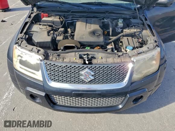 ✅ 2010 Suzuki Grand Vitara XSport • VIN: JS3TE0D41A4100177 • Lot: 94801285. Listed on Copart with 68,235 mi. Free auction sales archive from the USA and detailed vehicle history report at DreamBid. Image 12.