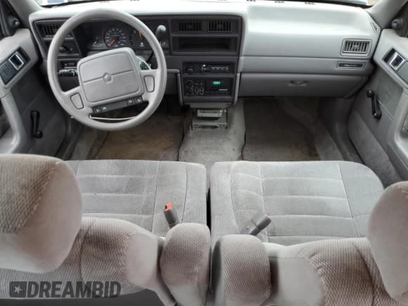 ✅ 1993 Dodge Spirit • VIN: 3B3XA4632PT520185 • Lot: 54891565. Listed on Copart with 125,574 mi. Free auction sales archive from the USA and detailed vehicle history report at DreamBid. Image 8.