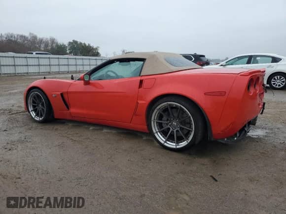 2013 Chevrolet Corvette 427 1SB with VIN 1G1YY3DE5D5702223, listed as a Copart auction lot 39260444 with 55,937 mi miles and Salvage title. Bid and sale history available at DreamBid. Image 2.