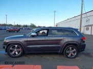 ✅ 2015 Jeep Grand Cherokee Overland • VIN: 1C4RJFCG3FC697994 • Lot: 40526924. Listed on IAAI with 199,275 mi. Free auction sales archive from the USA and detailed vehicle history report at DreamBid. Image 14.