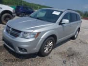✅ 2014 Dodge Journey SXT • VIN: 3C4PDCBB0ET133029 • Lot: 42434575. Listed on IAAI with 218,609 mi. Free auction sales archive from the USA and detailed vehicle history report at DreamBid. Image 2.