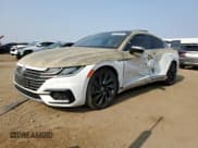 ✅ 2020 Volkswagen Arteon SEL Premium R-Line • VIN: WVWTR7AN5LE016983 • Лот: 64436704. Опубликован ранее на Copart с пробегом 45 753 миль. Бесплатный доступ к архиву аукционных продаж из США и подробный отчёт об истории автомобиля на DreamBid. Изображение 1.