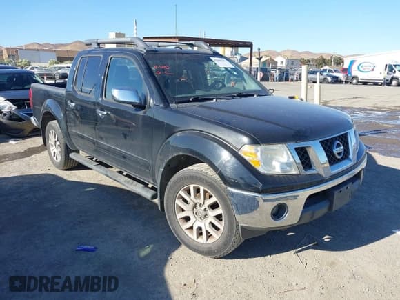 ✅ 2011 Nissan Frontier Pro-4X • VIN: 1N6AD0EV7BC440969 • Lot: 42968301. Listed on IAAI with 165,210 mi. Free auction sales archive from the USA and detailed vehicle history report at DreamBid. Image 1.